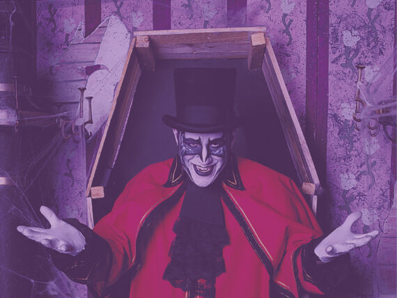 Darkus Knight, one of the main ghoolish characters that appears at Tweetsie Railroad during the Ghost Train event in the Fall, against a background with a coffin